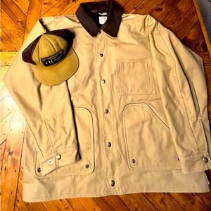 Vintage C.C.Filson Outdoors Tin cloth field jacket with Filson mesh trucker hat.